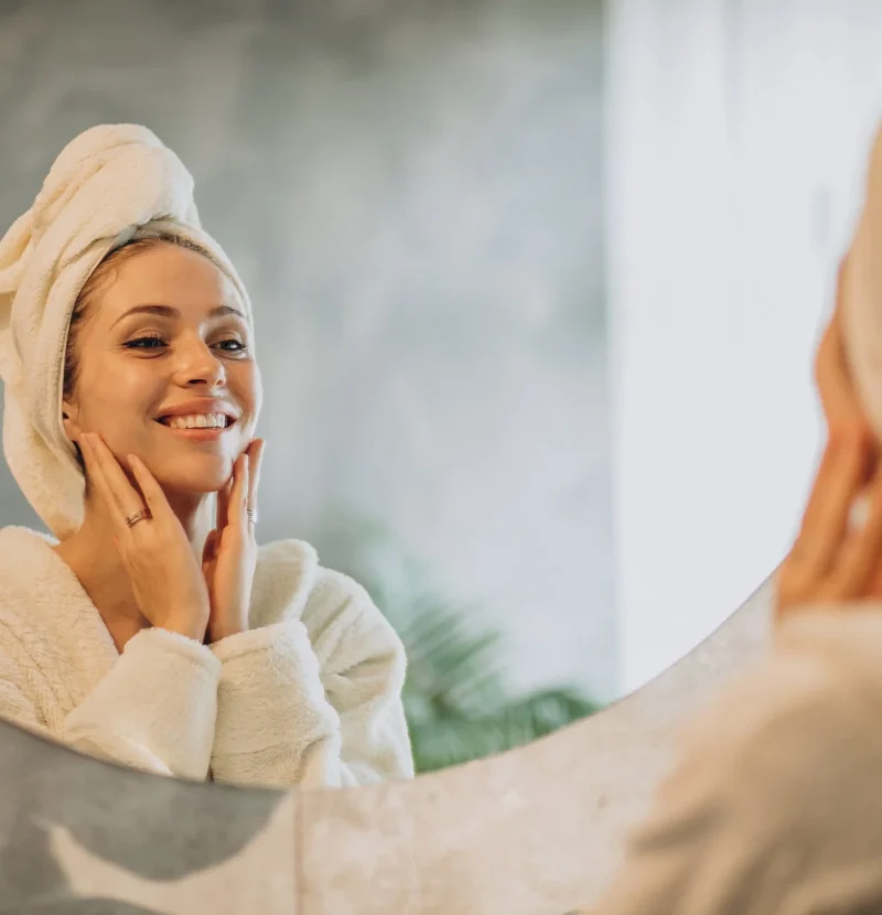 woman-home-applying-cream-mask-scaled